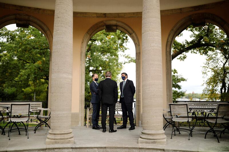 UAE Foreign Minister Sheikh Abdullah bin Zayed, right, his Israeli counterpart Gabi Ashkenazi, centre, and German Foreign Minister Heiko Maas before their historic meeting at Villa Borsig in Berlin, Germany.  AFP