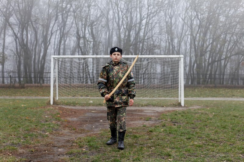 A cadet holds a model of a sword in front of a goalpost as he trains in Stavropol, Russia. Eduard Korniyenko / Reuters