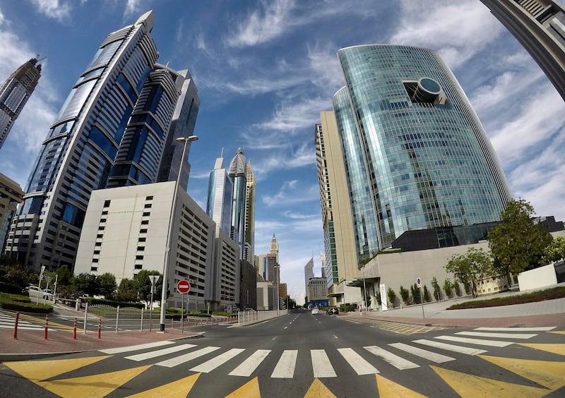 DUBAI, UNITED ARAB EMIRATES , April 06– 2020 :- View of the empty road in DIFC area in Dubai. Dubai is conducting 24 hours sterilisation programme across all areas and communities in the Emirate and told residents to stay at home. UAE government told residents to wear face mask and gloves all the times outside the home. (Pawan Singh / The National) For News/Online/Instagram.