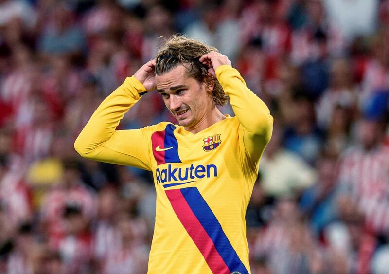 Antoine Griezmann reacts during the match. The Frenchman, who moved from Atletico Madrid to the league champions, endured a quiet debut. EPA