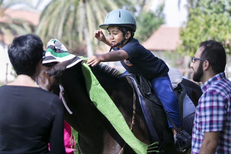 A youngster at the Riding for the Disabled Association. Reem Mohammed / The National