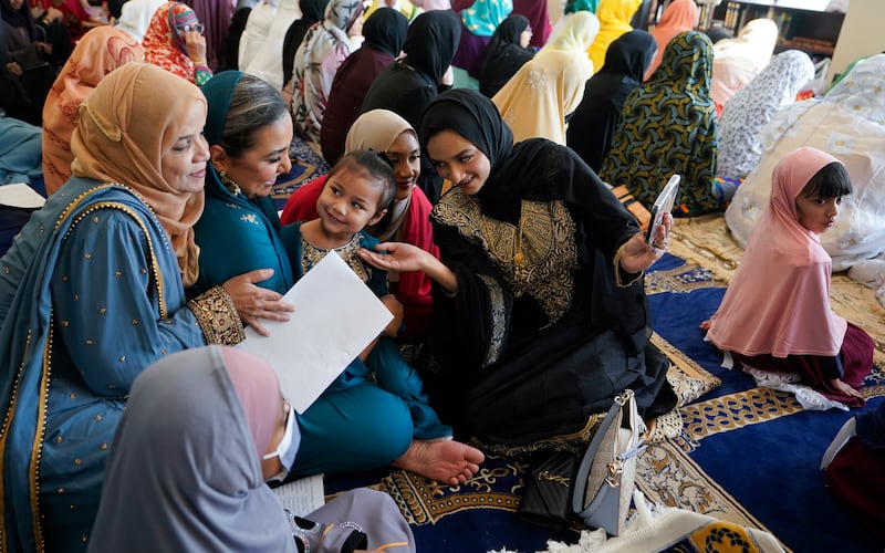 Muslims gather before Eid Al Fitr prayers at the Muslim Community Centre in Silver Spring, Maryland. There are signs that Muslim Americans are gaining more visibility. AP