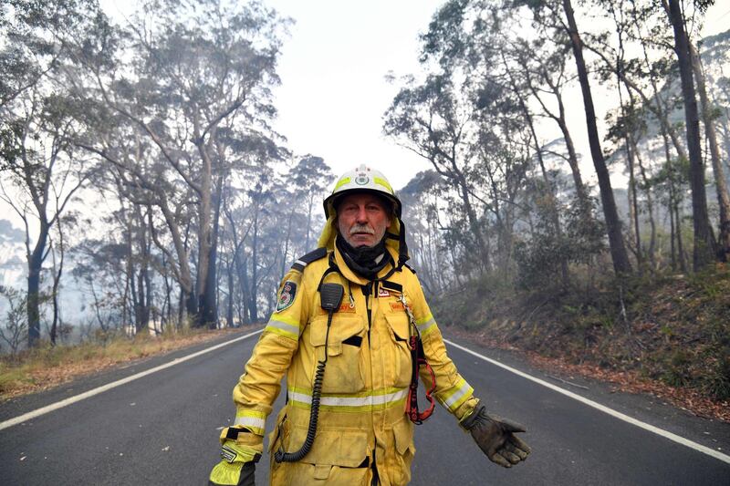 Volunteer firefighter Gary Stokes monitoring bushfires close to the residential area in Dargan, some 120 kilometres from Sydney. AFP