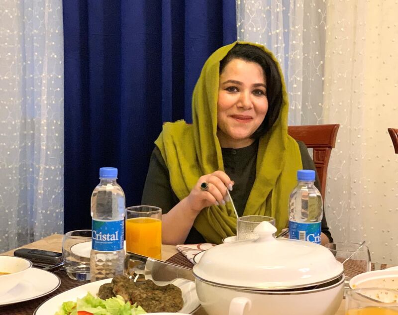 Nargis Nehan, 37, Afghanistan's acting minister for mining and petroleum, hosts friends for iftar at her home in Central Kabul on June 1, 2019. Hikmat Noori for The National