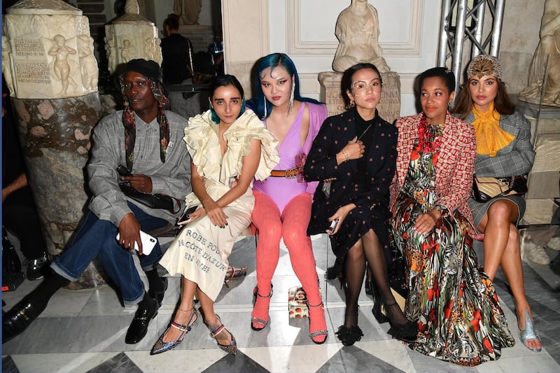 Guests attend Gucci Cruise 2020 at Musei Capitolini on May 28, 2019 in Rome. Gucci co-designed a collection in 2016 with "Guccighost", a street artist who painted quirky versions of its logos around New York and posted them online, helping its social media credentials. Getty