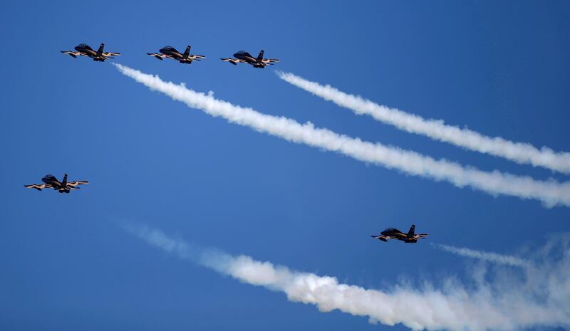 The Al Fursan  National Aerobatic Team perform a fly-by. EPA