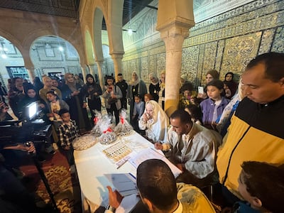 A Tunisian couple getting married at the Sid Sahbi mausoleum in Kairouan. Ghaya Ben Mbarek / The National
