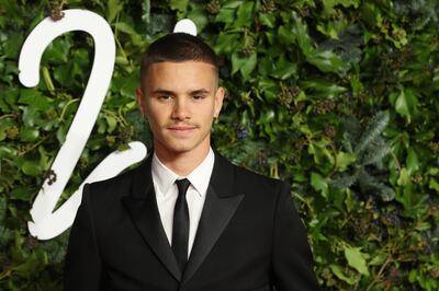 Romeo Beckham has been named the global face of athletic wear brand Puma in a deal worth £1.2m. Photo: EPA