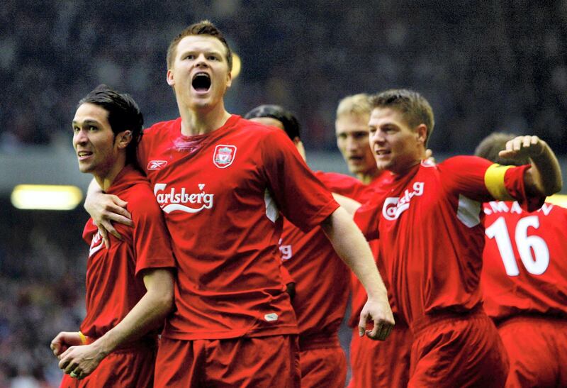 Liverpool's Norwegian player John Arne Riise (2nd L) celebrates with Luis Garcia (L) and Steven Gerrard (C back) after Garcia scored the opening goal against Chelsea during the Champions League semi-final second leg football match at Anfield in Liverpool 02 May 2005. Liverpool won 1-0 to advance to the final. AFP PHOTO ADRIAN DENNIS / AFP PHOTO / ADRIAN DENNIS