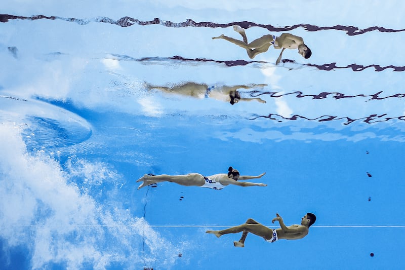Mexico's Trinidad Meza Rodriguez and Diego Villalobos Carrillo in action during the artistic swimming, mixed duet free final,  at the World Aquatics Championships, in Doha. Reuters