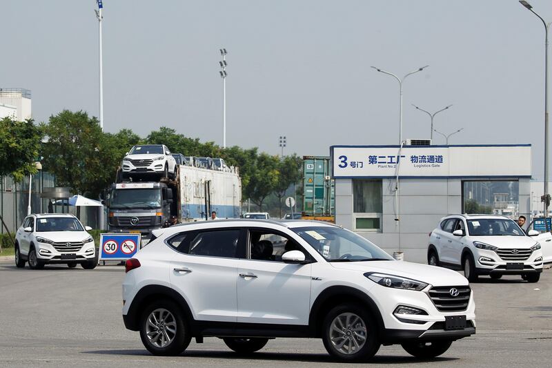 Hyundai cars leave a plant of Hyundai Motor Co in Beijing, China, August 30, 2017. Picture taken August 30, 2017.  REUTERS/Thomas Peter