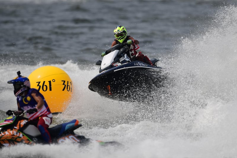 United Arab Emirates' Khalid Almaazmi (R) competes in the jetski sport runabout 1100 stock final during the 2018 Asian Games in Jakarta. AFP