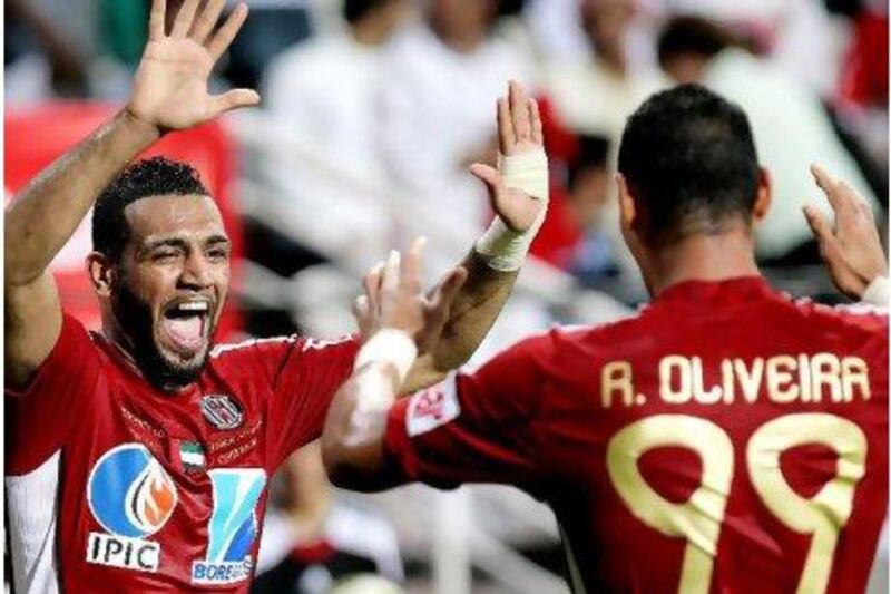 Ricardo Oliveira, right, was on the score sheet against Dubai last night as Al Jazira ended their campaign on a high.