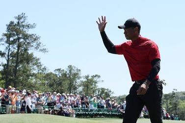 Golf - The Masters - Augusta National Golf Club - Augusta, Georgia, U. S.  - April 10, 2022 Tiger Woods of the U. S.  waves to patrons on the 18th after finishing his final round REUTERS / Mike Segar
