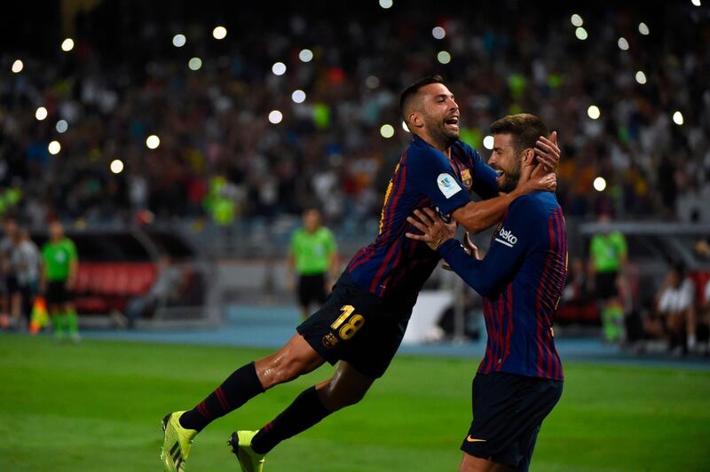 Barcelona's Gerard Pique celebrates after scoring a goal. AFP