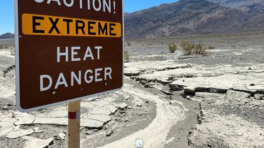A sign board warning of extreme heat in Death Valley, California. Reuters