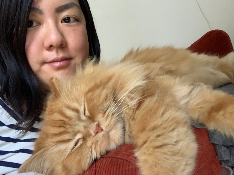 Evelyn Lau with her cat Amy. All photos: Evelyn Lau / The National