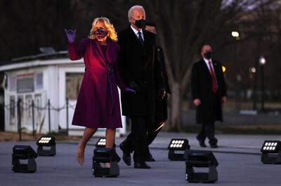 WASHINGTON, DC - JANUARY 19: Dr. Jill Biden and President-elect Joe Biden arrive for a memorial for victims of the coronavirus (COVID-19) pandemic at the Lincoln Memorial on the eve of the presidential inauguration on January 19, 2021 in Washington, DC. There have been nearly 400,00 deaths in the U.S. since the first confirmed case of the virus in Seattle in January of 2020.   Michael M. Santiago/Getty Images/AFP
== FOR NEWSPAPERS, INTERNET, TELCOS & TELEVISION USE ONLY ==
