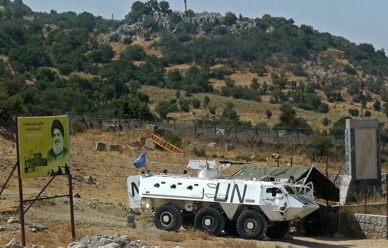 This picture taken on July 28, 2020 shows a vehicle of the United Nations peacekeeping force (UNIFIL) on patrol near the southern Lebanese village of Shebaa near the border with Israel.  / AFP / Mahmoud ZAYYAT
