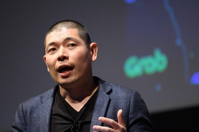 Anthony Tan, group chief executive officer and co-founder of Grab Holdings Inc., speaks during the SoftBank World 2019 event in Tokyo, Japan, on Thursday, July 18, 2019. Tan said the company captures 40 terabytes of data daily through its "superapp," which has been downloaded 155 million times by customers who use it to call a ride, order lunch and pay for purchases. Photographer: Akio Kon/Bloomberg