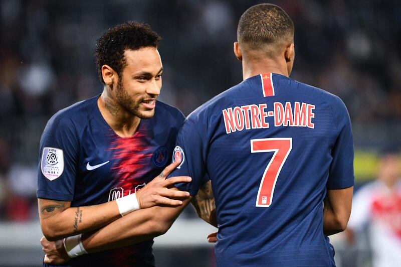 Paris Saint-Germain's Brazilian forward Neymar, left,) and teammate Kylian Mbappe. AFP
