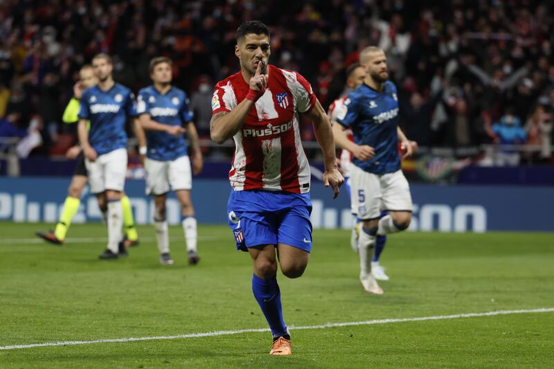 Luis Suarez celebrates after scoring Atletico Madrid's second goal against Alaves. EPA