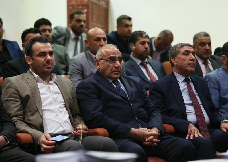 epa07065176 A handout photo made available by the Iraqi Parliament Office shows Adel Abdul Mahdi (2-L), the newly appointed Prime Minister attending a press conference at the headquarter of Iraqi parliament in Baghdad, Iraq, 02 October 2018. According to media reports, Iraq's parliament has elected Barham Salih as the new president on 02 October 2018. Barham Salih was running against the Kurdistan Democratic Party's (KDP) candidate, Fuad Hussein who withdrew from the second round of vote, moments before the announcement of election results.  EPA/IRAQI PARLIAMENT HANDOUT  HANDOUT EDITORIAL USE ONLY/NO SALES