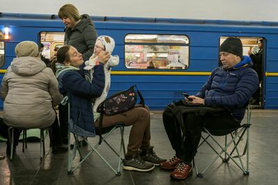 People shelter in a metro station during Russian missile attacks in Kyiv. Reuters 