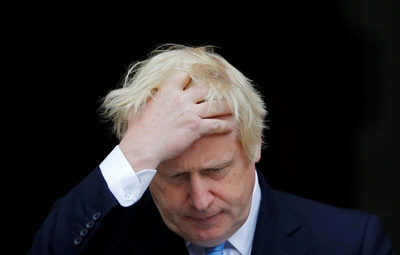 FILE PHOTO: Britain's Prime Minister Boris Johnson gestures as he meets Ireland's Prime Minister (Taoiseach) Leo Varadkar (not pictured) in Dublin, Ireland, September 9, 2019. REUTERS/Phil Noble/File Photo