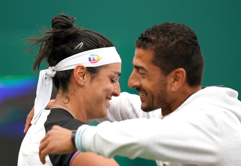 Tunisia's Ons Jabeur celebrates with her coach Issam Jellali.