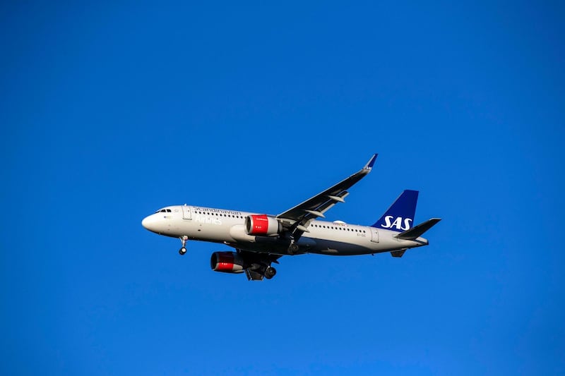A SAS Scandinavian Airlines Ireland Airbus A320-251N plane lands at Heathrow Airport in West London. PA Archive/PA Images