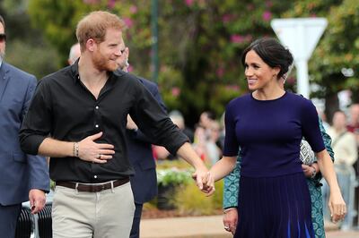 (FILES) In this file photo taken on October 31, 2018 Britain's Prince Harry and Meghan, Duchess of Sussex arrive for a public walkabout at the Rotorua Government Gardens in Rotorua, New Zealand.  Prince Harry and his pregnant wife Meghan Markle will move into a historic cottage on the royal family's Windsor Estate early next year, Kensington Palace said on Saturday, November 24, 2018. / AFP / POOL / MICHAEL BRADLEY
