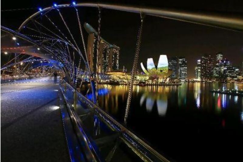 The Helix Bridge, Marina Bay Sands and the ArtScience Museum are some of Singapore's best-known landmarks. Suhaimi Abdullah / Getty Images