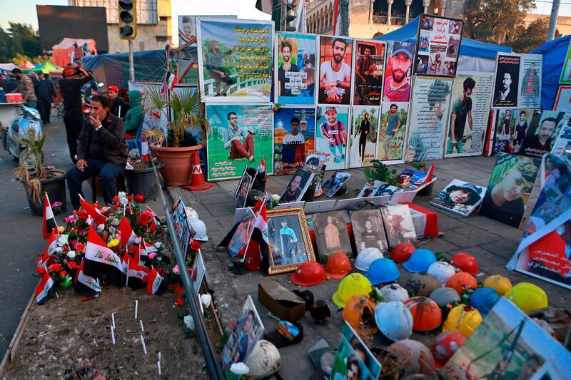 Posters of protesters who have been killed in anti-government demonstrations and their belongings are displayed in Tahrir Square during ongoing protests in Baghdad. AP Photo