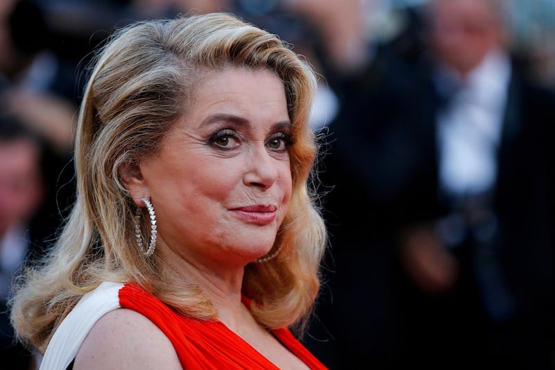 FILE PHOTO: 70th Cannes Film Festival - Event for the 70th Anniversary of the festival - Red Carpet Arrivals - Cannes, France. 23/05/2017. Actress Catherine Deneuve poses. REUTERS/Stephane Mahe/File Photo