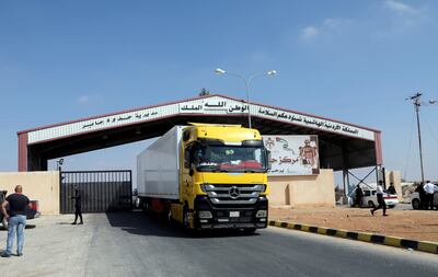 A lorry drives through the Jaber border crossing with Syria, near Mafraq, Jordan. Reuters