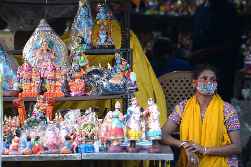 A vendor selling idols in Chennai. AFP