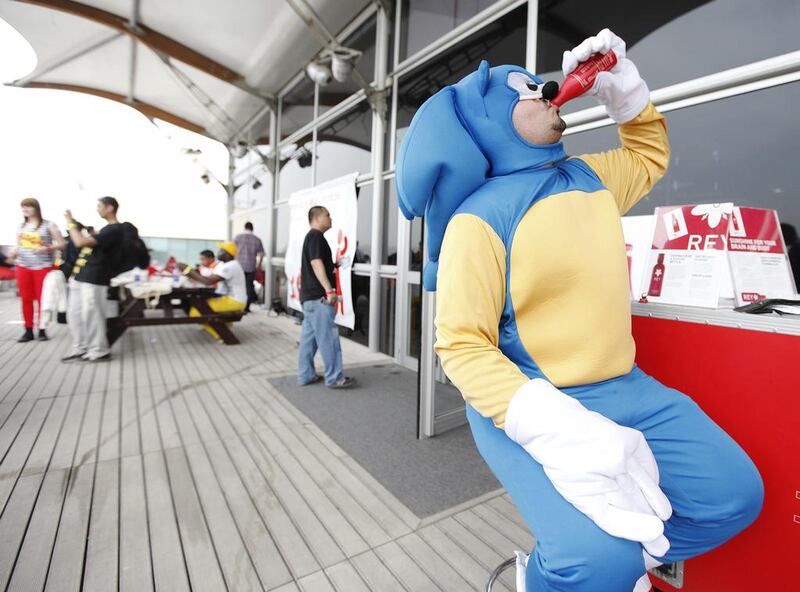 Sonic the Hedgehog quenches his thirst at the Middle East Film and Comic Con in Dubai on April 5, 2013. Sarah Dea / The National)