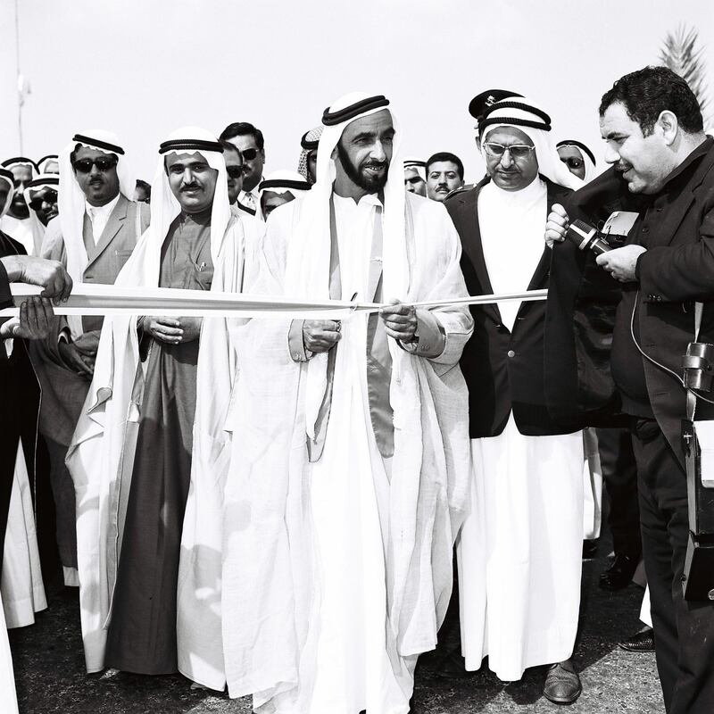 History Project 2010, "The First Day". Image from Al Itihad Union day 1971 collection.   ?Accession Day - Day 2. November 29 1971. Sheikh Zayed opens the Abu Dhabi - Dubai  Road (now known as Shiekh Zayed Road)    (NEED TO CONFIRM**) 

Credit: Al Itihad. ??