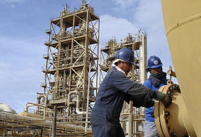 Workers at the Sirte Oil Company in Brega, Libya. The blockade has cost Libya $11bn in fiscal revenue. Reuters
