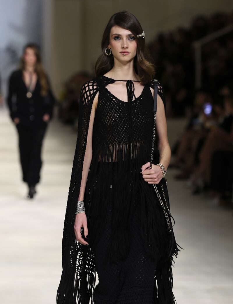 A fringed dress with a crocheted cape