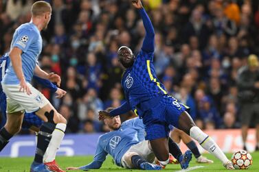 Lasse Nielsen (2-R) of Malmo fouls Romelu Lukaku (R) of Chelsea in the penalty area during the UEFA Champions League group H soccer match between Chelsea FC and Malmo FF in London, Britain, 20 October 2021.   EPA / Neil Hall