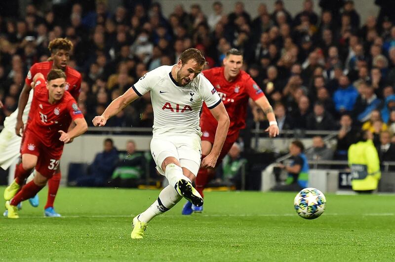 Tottenham Hotspur striker Harry Kane scores their second goal from the penalty spot. AFP