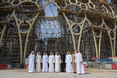 Sheikh Ahmed Al Maktoum, chairman of the Expo Dubai 2020 higher committee, and other dignitaries with the Al Wasl Plaza completed dome in the background. Courtesy Expo 2020