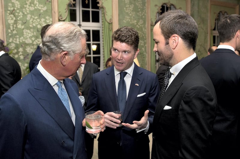 LONDON, ENGLAND - MARCH 9:  Prince Charles, Prince of Wales and U.S. Ambassador to Britain Matthew Barzun, center, speak to U.S. fashion designer Tom Ford, right, during a reception for Americans living and working in the UK, at the official residence of the U.S. Ambassador to Britain, Winfield House on March 9, 2015 in London, United Kingdom. The reception was held Monday evening ahead of Prince Charles and his wife Camilla visiting the U.S. next week. (Photo by Matt Dunham - WPA Pool/Getty Images)