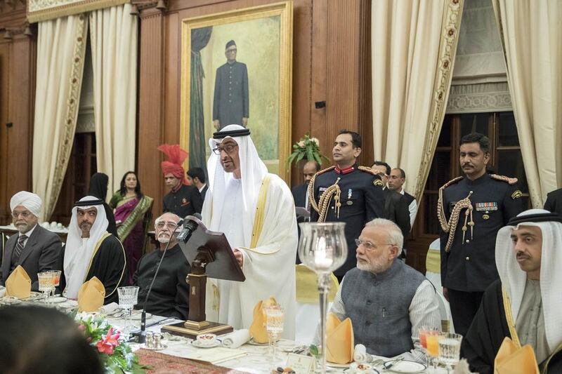 Sheikh Mohammed bin Zayed makes a speech during a dinner reception at Rashtrapati Bhavan. Also present are Sheikh Hamed bin Zayed, Chairman of the Crown Prince Court of Abu Dhabi, second left, Mohammad Hamid Ansari, Vice President of India, third left, Sheikh Abdullah, Minister of Foreign Affairs and International Cooperation, right, and Narendra Modi, Prime Minister of India, second right. Mohamed Al Hammadi / Crown Prince Court - Abu Dhabi