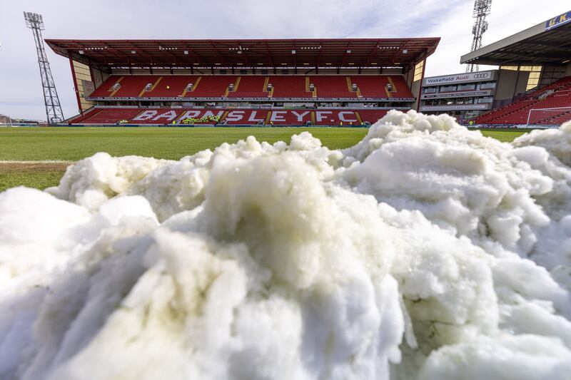 Snow at the side of the football pitch at Oakwell Stadium, in Barnsley. PA