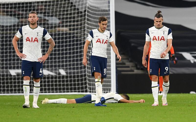 Dejected Spurs players after the late West Ham goal. PA