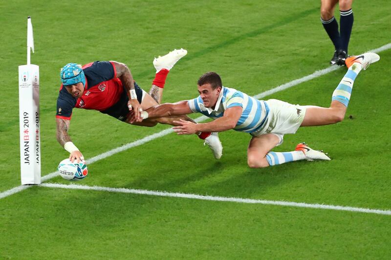 Jack Nowell scores England's fifth try during the Rugby World Cup match against Argentina. Getty