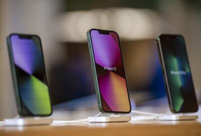 iPhone 13 smartphones in new alpine green on display at an Apple store in Covent Garden in London. Bloomberg